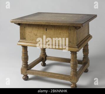 Geldtafel Money table or pay table of oak with a shear blade. The case-shaped upper part has chamfered corner posts, a profiled base and rests on four legs with houses and vase-shaped sections. The legs are connected by profiled under rules, which on the inside and outside are decorated with an inserted pigtail band. In front of the coffin is the lock. Inside each of the side walls against a hanging container with shearable cover; including three laatjes. Manufacturer : anonymous anonymous place manufacture: Northern Netherlands Netherlands Dated: 1600 - 1650 Material: oak wood Dimensions: h 7 Stock Photo