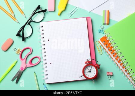 Different stationary on mint background, top view and space for text Stock Photo