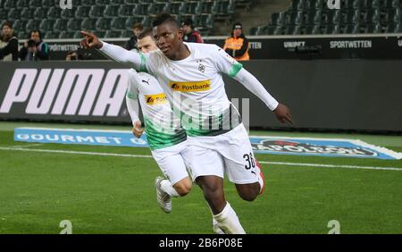 Monchengladach, Germany. 11th Mar, 2020. firo: 11.03.2020, soccer, 2019/2020, 1.Bundesliga: Vfl Borussia Monchengladbach, Gladbach Borussia Monchengladbach - 1.FC Cologne Koeln jubilation Breel Embolo before empty ranks after goal for 1: 0 resulting held by spectators and fans. 1. Ghost game of the 1. Credit: dpa picture alliance/Alamy Live News Stock Photo