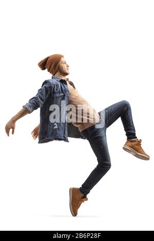 Full length shot of a young male dancer in casual clothes dancing isolated on white background Stock Photo