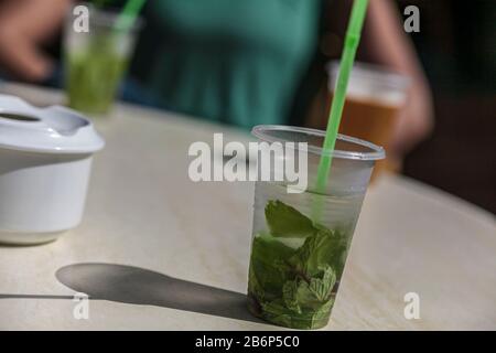 Cocktail mojito in plastic glass with ice Stock Photo by ©eduardkraft  11955436