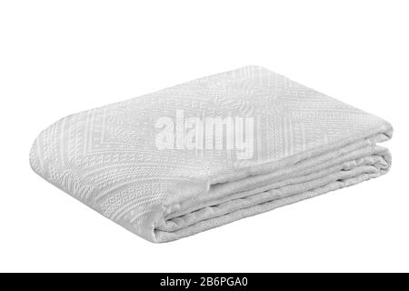 Stack of white folded bedding sheets isolated on white Stock Photo