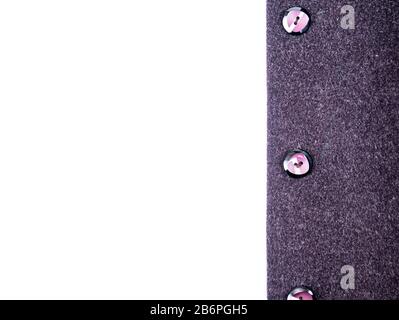 Colored button on a woolen cloth coat. Stock Photo