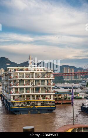 Chongqing, China - August 2019 : Back of the luxury cruising ship docked in port on the riverbank of Yangtze river in Chongqing town Stock Photo