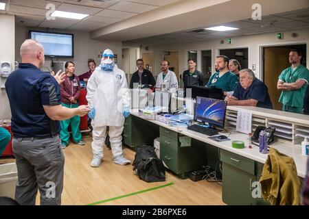 National Guard providing Coronavirus personal protective equipment (PPE) training at Cabell Huntington Hospital in preparation for Coronavirus cases. Stock Photo