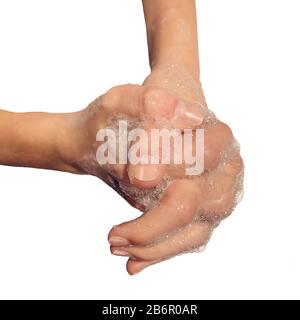 Hand washing hygiene using soap and water to clean dirty contaminated skin to avoid illness or the flu by handwashing and cleaning fingers. Stock Photo