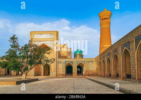Inner courtyard at Islamic religious complex Po-i-Kalyan located around the Kalan minaret with the madrasa. Bukhara. Uzbekistan Stock Photo