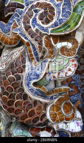Mosaic details in the Vietnamese Ve Chai Pagoda. Linh Phuoc Pagoda or the Ve Chai Pagoda - a Buddhist dragon temple in the city of Dalat in Vietnam.