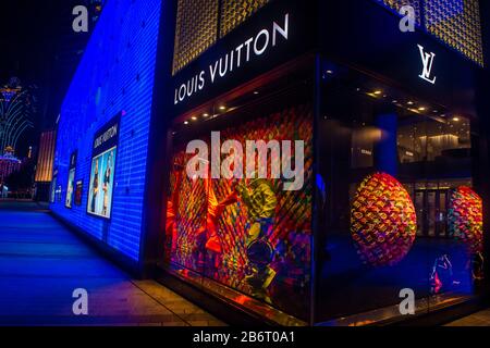 Night view of illuminated billboard in window of Louis Vuitton store in  Omotesando Tokyo Japan Stock Photo - Alamy