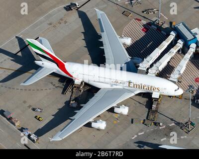 Emirates Airline Airbus A380 parked at airport terminal after arrival from Dubai, United Arab Emirates. Airplane registered as A6-EEQ. Stock Photo