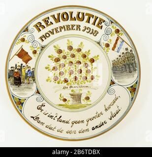 Herdenkingsbord Revolutie november 1918 Commemorative Plate Revolution November 1918 Object Type : sign (crockery) commemorative plate Item number: NG-1972-12-C Inscriptions / Brands: inscription, v.z. edge "REVOLUTION NOVEMBER 1918 There is in this country no greater evil, then that one another slaat'opschrift, v.z. flat, "the Oranjeboom'merk, verso:" FWAs No. 539, "in part definition: Commemorative Plate Revolution of November 1918 painted and glazed pottery; middle front tree with green leaves and brown apples in jar with ribbon Where: on 'The Orange'. In the fifth circle with colored lines Stock Photo
