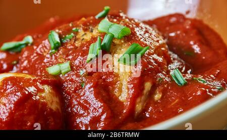 Doro Wat, stew or curry that may be prepared with chicken, beef,  Ethiopian cuisine, Traditional assorted African dishes, Top view. Stock Photo