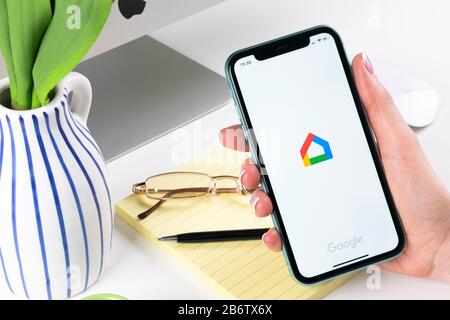 Helsinki, Finland, January 30, 2020: Google Home application icon on Apple iPhone X smartphone screen close-up. Google home app icon. Social network. Stock Photo