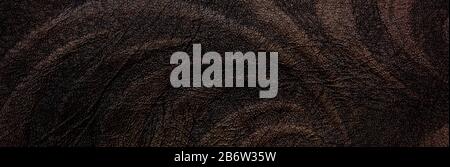 A banner of brown leather texture with a pattern. Background Stock Photo
