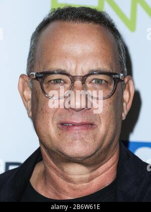 (FILE) Tom Hanks and Rita Wilson Test Positive for Coronavirus COVID-19. Tom Hanks and Rita Wilson have announced on Wednesday, March 11, 2020 that they have tested positive for COVID-19 (Coronavirus), the first celebrities to go public with a diagnosis. LOS ANGELES, CALIFORNIA, USA - SEPTEMBER 09: Actor Tom Hanks arrives at the Stand Up To Cancer 2016 held at the Walt Disney Concert Hall on September 9, 2016 in Los Angeles, California, United States. (Photo by Xavier Collin/Image Press Agency) Stock Photo