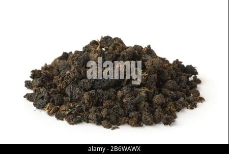 Pile of granular black tea isolated on white Stock Photo