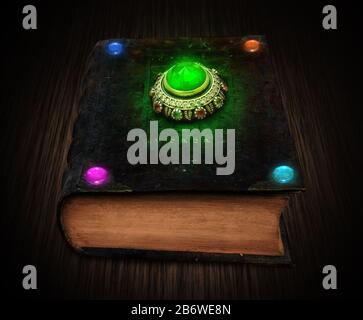 Mystical book with glowing gemstones. Witchcraft book concept. Stock Photo