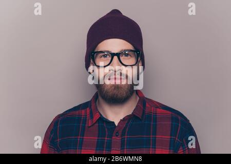 Portrait of young confident serious hipster man in glasses. Stock Photo