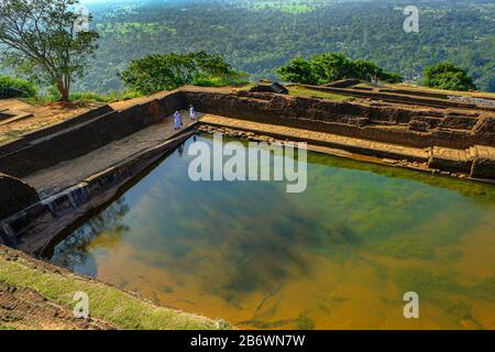 Sigiriya, Sri Lanka - February 2020: People visiting the fortress of Sigiriya Rock on February 9, 2020 in Sigiriya, Sri Lanka. Stock Photo