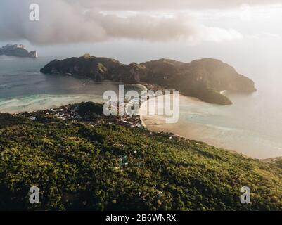 Aerial shot of thailandese islands with blue water, white sand and jungle Stock Photo