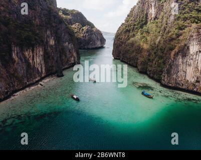 Aerial shot of thailandese islands with blue water, white sand and jungle Stock Photo