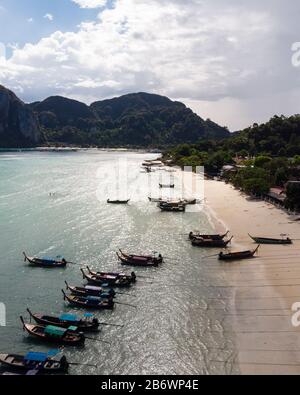 Aerial shot of thailandese islands with blue water, white sand and jungle Stock Photo