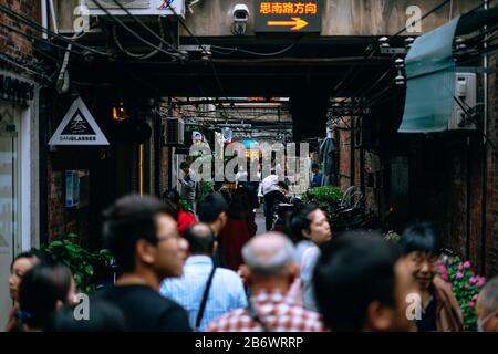 Shanghai, China; Nov 28 2017: People walking in chinese street market Stock Photo