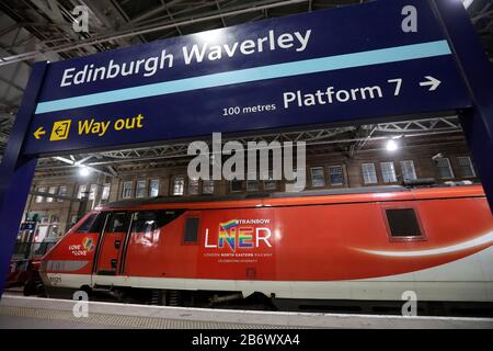 An LNER train at Waverley train Station in Edinburgh. Stock Photo