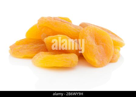 Dried stoneless apricots. Isolated on white background with shadow reflection. With clipping path. With vector path. Dried heap of apricots on white b Stock Photo