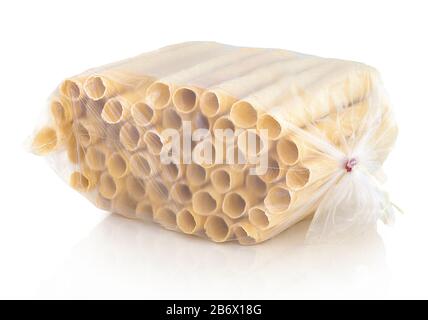 Christmas tube-shaped wafers from supermarket in the carry bag. In slovak called: 'Trubičky'. Isolated on white background with shadow reflection. Wit Stock Photo