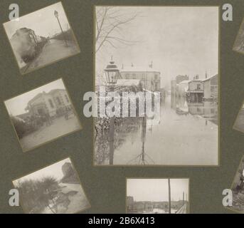 Jongens bouwen een bruggetje in ondergelopen land in een buitenwijk van Parijs Part of album flooding Paris suburbs 1910. Manufacturer : Photographer: G. DangereuxPlaats manufacture: Paris Date : Jan 1910 Physical features: matte daglichtcollodiumzilverdruk platinum shown material: paper Technique: matte daglichtcollodiumzilverdruk Dimensions: h 51 mm × W 60 mm Subject: flood (+ landscape with figures, staffage) Where: Paris Stock Photo