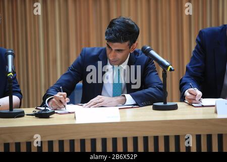 Chancellor Rishi Sunak signing the West Yorkshire Combined Authority devolution deal during a visit to the Nexus Building at the University of Leeds. Stock Photo