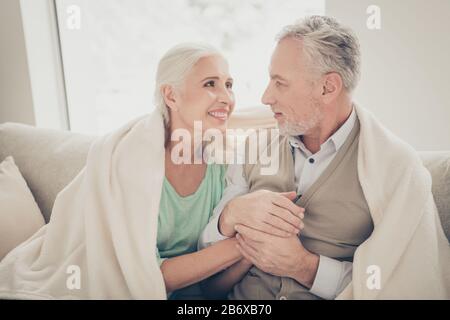Closeup photo of two positive gentle carefree spouses sweethearts feeling good spending free time and leisure together Stock Photo