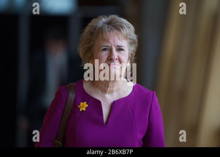 Edinburgh, UK. 12th Mar, 2020. Pictured: Roseanna Cunningham MSP - Cabinet Secretary for Environment, Climate Change and Land Reform. Scenes from First Ministers Questions at the Scottish Parliament on the first week of the trial of Former First Minister - Alex Salmond, and tensions aa running high at Holyrood. Credit: Colin Fisher/Alamy Live News Stock Photo