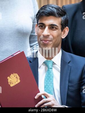 Chancellor Rishi Sunak with the signed West Yorkshire Combined Authority devolution deal during a visit to the Nexus Building at the University of Leeds. Stock Photo