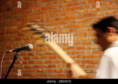 Playing electric guitar on stage. Blurred image. Stock Photo