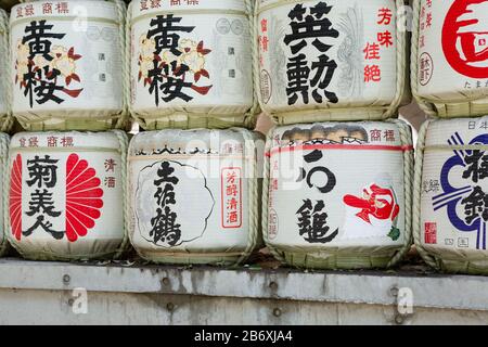Sake barrels in the park surrounding Meiji Jingu, Shinjuku, Tokyo, Japan.