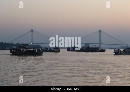 Boats at Hooghly River during sunset