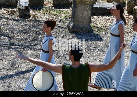 Olympia, Greece. 12th Mar, 2020. Performers are seen during the flame lighting ceremony for Tokyo 2020 Olympic Games in Olympia, Greece, March 12, 2020. Credit: Antonis Nikolopoulos/Xinhua/Alamy Live News Stock Photo