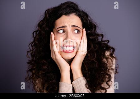 Close-up portrait of her she nice-looking attractive lovely charming cute nervous anxious wavy-haired lady scary bad news oh my God caution isolated Stock Photo