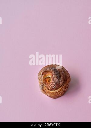 Da Bara Bakery cinnamon buns against a pink background Stock Photo