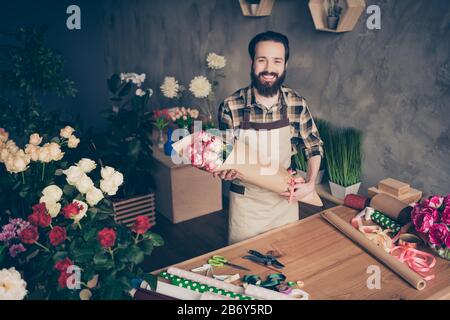 Portrait of cheerful excited relaxed person people handsome self-employed millennial hold hand surprise client feel content satisfied dressed checked Stock Photo