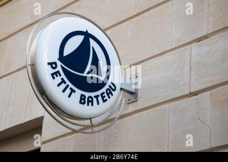 Bordeaux , Aquitaine / France - 11 25 2019 : Petit Bateau kids fashion store sign Small boat logo shop Stock Photo