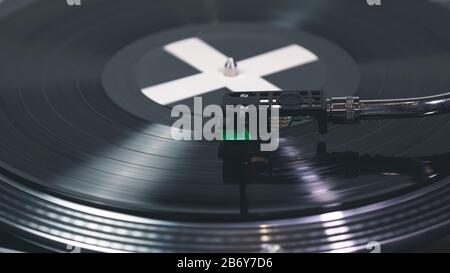 Close-up of modern turntable vinyl record player with music plate. Needle on a vinyl record. Concept of sound technology audio equipment Stock Photo