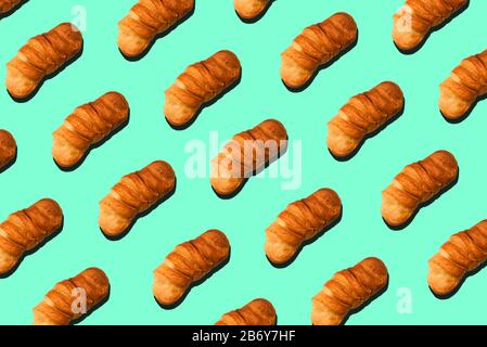 Fresh bread on a colorful background. Modern design, art of repetition Stock Photo