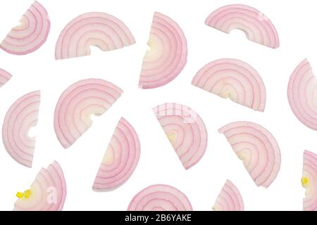 Half moon slices of red onion on white background Stock Photo
