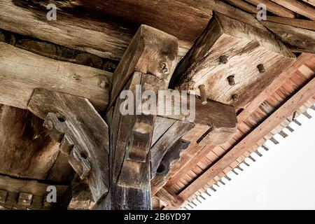 Timber connected with wooden nails on an old wooden church in Maramures Stock Photo