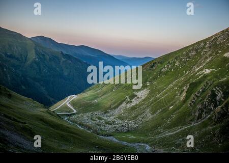 Wild scenery of windy mountain road on Transfagarasan Stock Photo