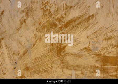 An old, rusty, colored plate with traces of background painting Stock Photo