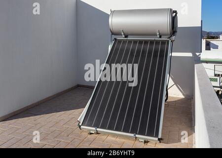 Alternative heating of water using solar panels. A pure form of energy Stock Photo